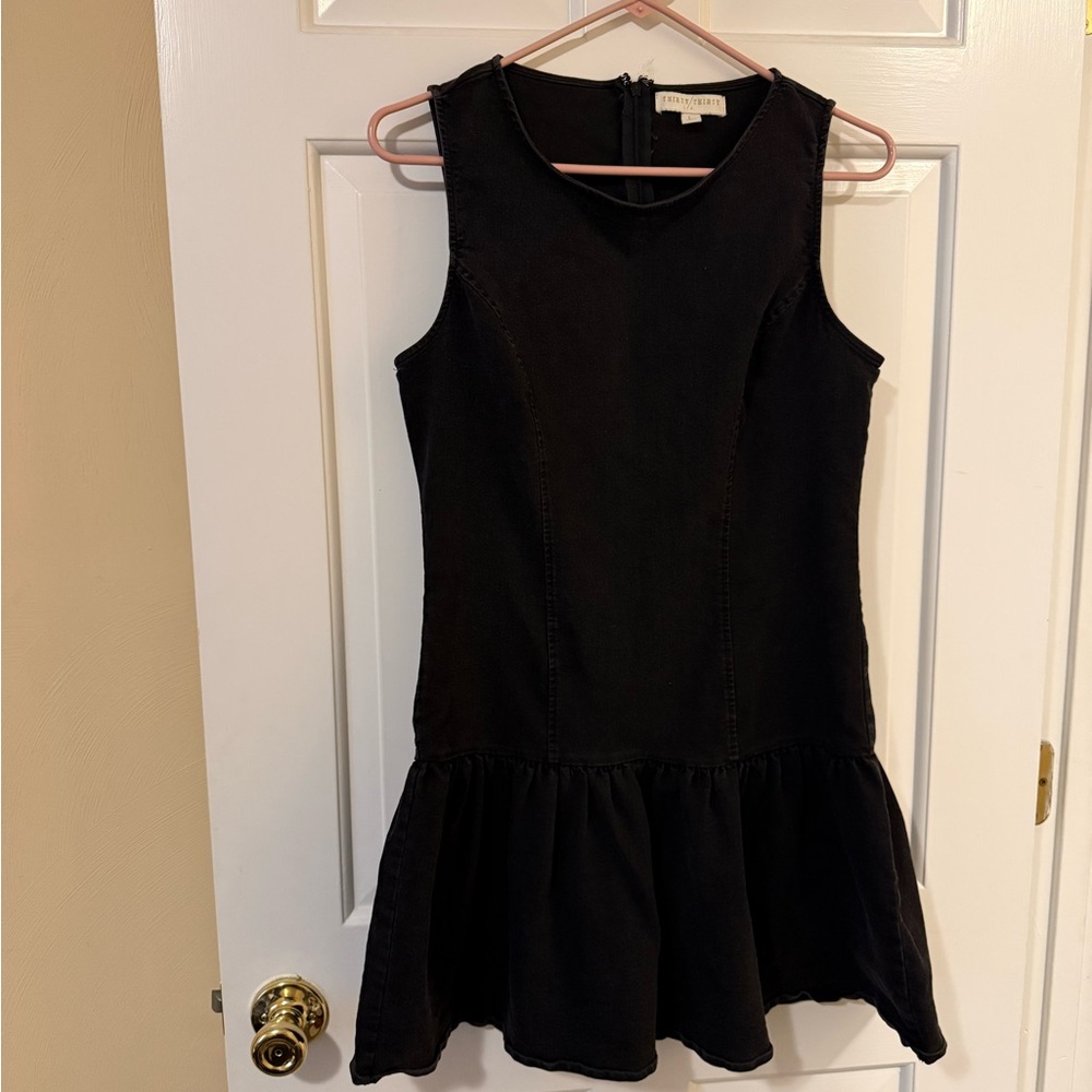 Sleeveless Black Mini Dress with Flounced Hem
